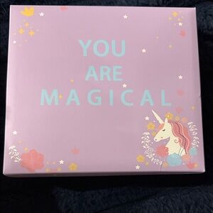 Unicorn socks in a purple box 'You Are Magical'